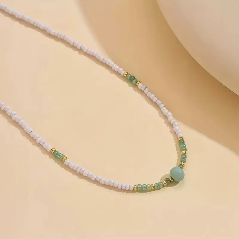 White Beaded Necklace with Green Stone – Minimalist Gold Accent Jewellery