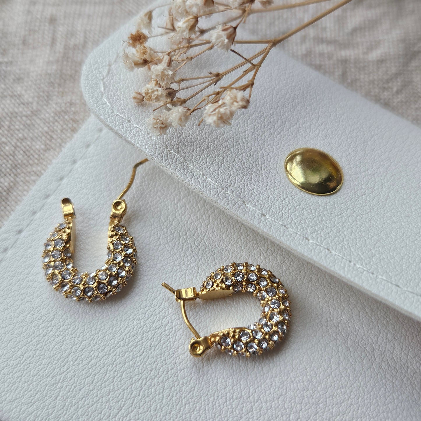 Glimmering Radiance: Gold Earrings with Small Zirconia