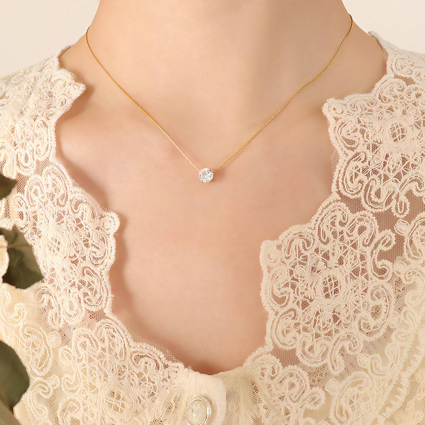 Timeless Beauty: Petite Zirconia Pendant on a Fine Gold Necklace